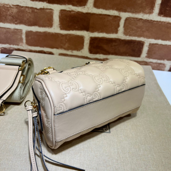 G*u*i gg matelassé leather top handle bag
