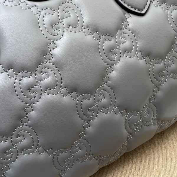 G*u*i gg matelassé leather top handle bag