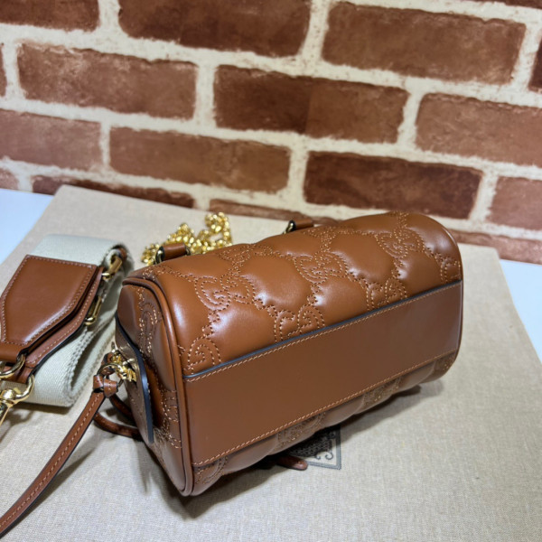 G*u*i gg matelassé leather top handle bag