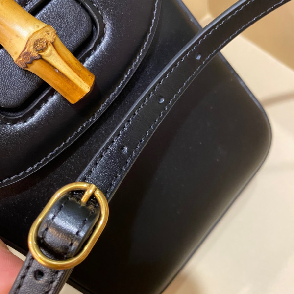 G*u*i bamboo mini handbag