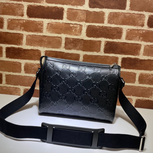 G*u*i gg embossed messenger bag
