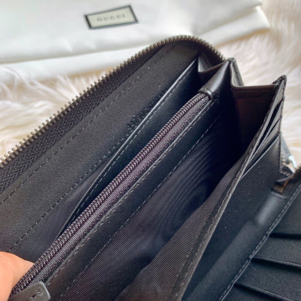 G*u*i leather zip around wallet