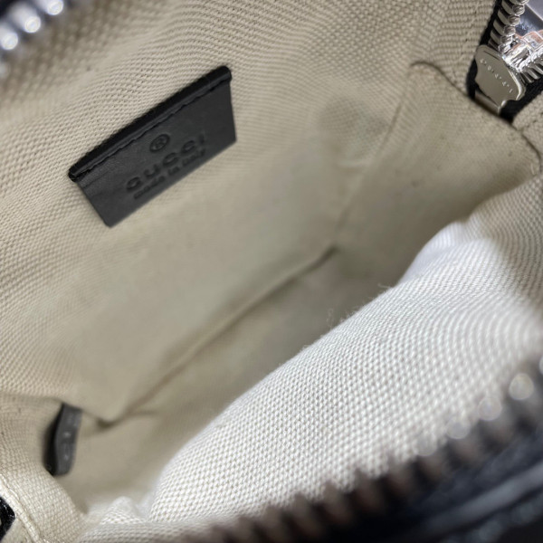 G*u*i gg embossed mini bag