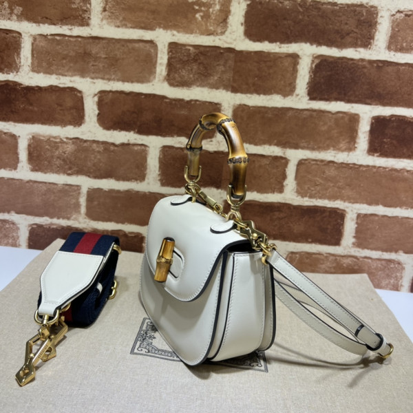 G*u*i mini top handle bag with bamboo