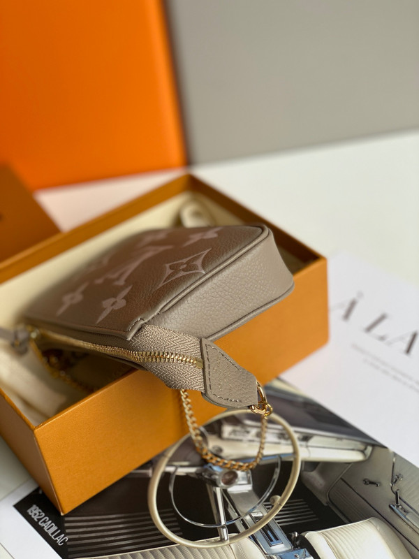 l**is V*t*n mini pochette accessoires