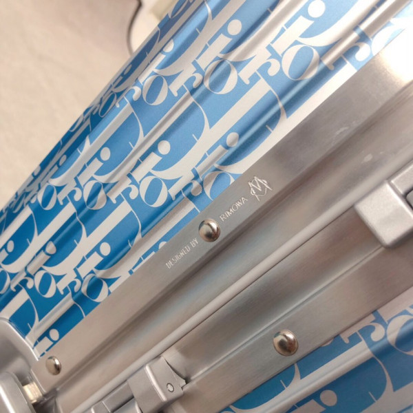D*or x rimowa suitcase