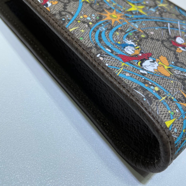 disney x G*u*i donald duck mini bag