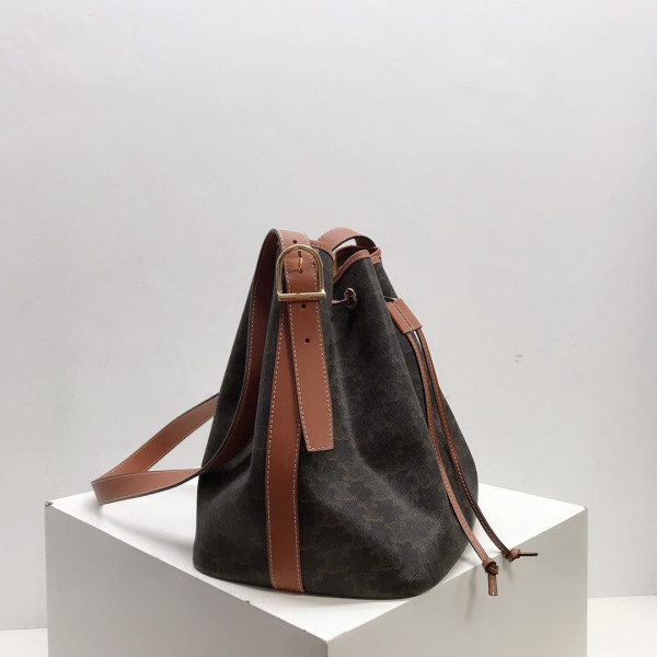 Ce**e medium drawstring bag in triomphe canvas