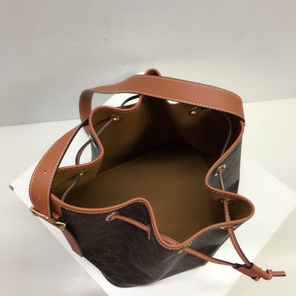 Ce**e medium drawstring bag in triomphe canvas