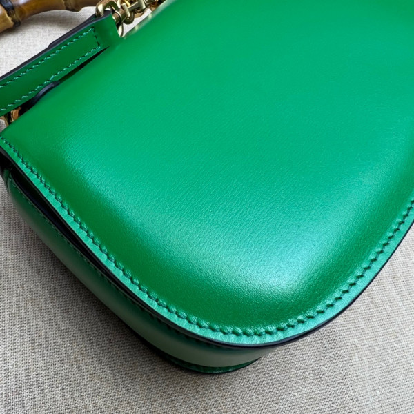 G*u*i mini top handle bag with bamboo