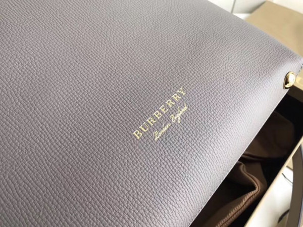 B**rry the small banner in leather and house check