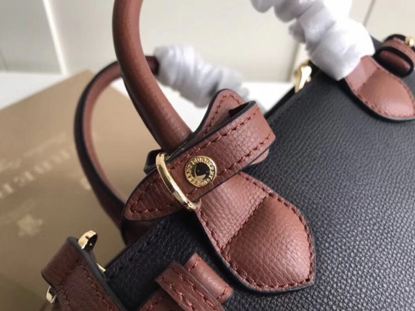 B**rry the small banner in leather and house check