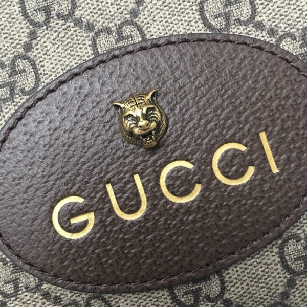 G*u*i gg messenger bag
