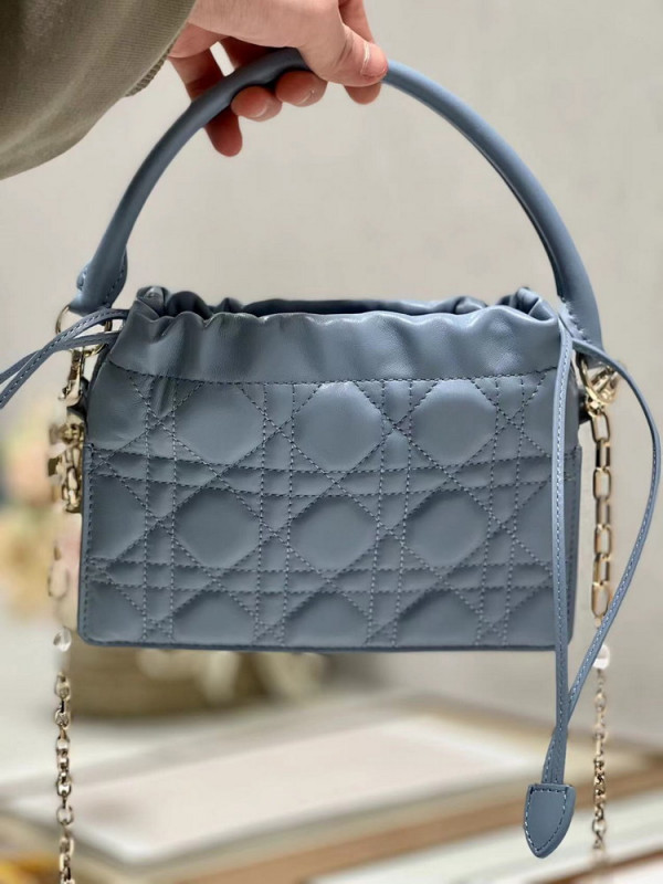 lady D*or top handle drawstring mini bag