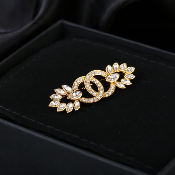 CL BROOCH